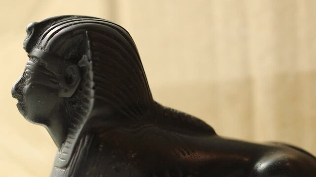 Ancient Egyptian-style sphinx sculpture, ideal for use in historical or mythological contexts