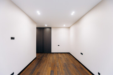 A beautifully designed Modern Minimalist Interior Space featuring elegant Wooden Flooring