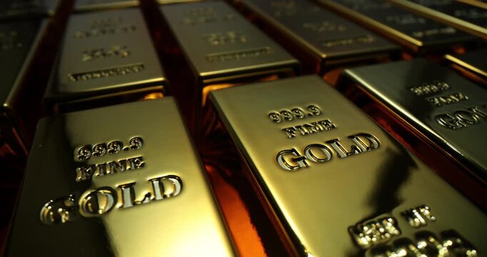 Heavy gold bars lie neatly arranged in perfect rows inside secure bank vault. Polished surfaces of marked ingots gleam brightly under artificial light