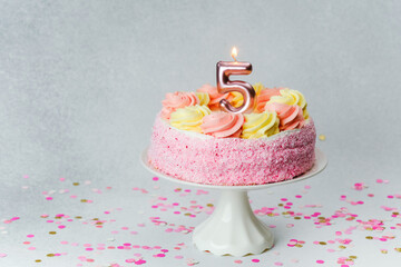 Celebration cake with candle for a five-year birthday party event