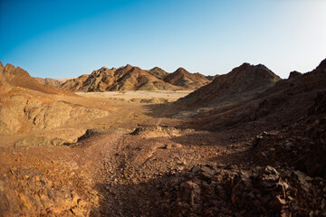 Fototapeta premium Mountains in the desert. Traveling through the desert of Israel. Tourism and travel in Israel. Eilat.