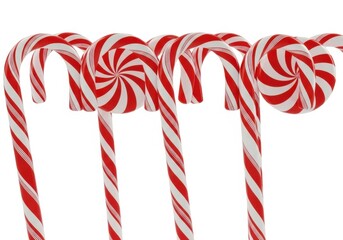 Obraz premium Row of red and white striped candy canes isolated on white background