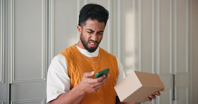 Man, confused and box with phone for delivery mistake, wrong shipping or package in home. Frustrated, male person or poor service with parcel or mobile smartphone for online shopping error or bad app