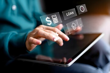 Person using tablet with loan and finance icons hovering above the screen close up on the hand and tablet