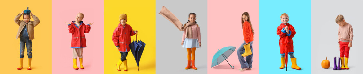Set of little children in rubber boots, with umbrellas and pumpkins on color background