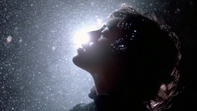 Illuminated Serenity: A Mesmerizing Journey of Light and Reflection Captured Through the Enchanting Silhouette of a Woman, Evoking Emotion and Wonder in a Dreamlike Atmosphere