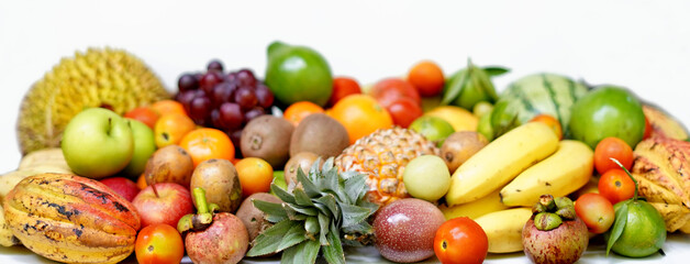 Colorful tropical fruits background for natural food.