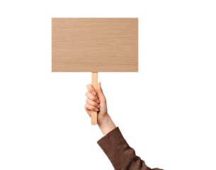 Female hand holding blank wooden sign for messages or protests on transparent background