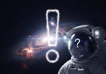 Astronaut in space with a glowing exclamation mark and question mark on helmet