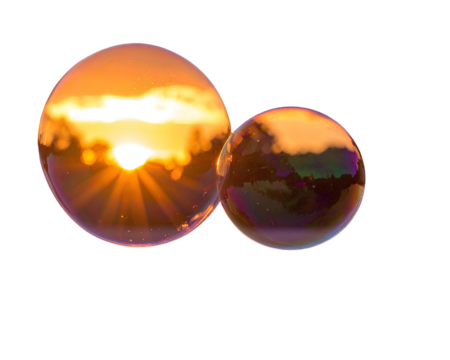  Soap bubbles reflecting the fiery colors of a sunset