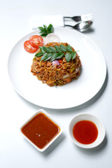 Traditional Sri Lankan Stir-Fried Kottu Roti on White Plate. food photography