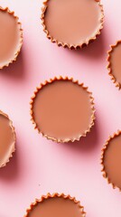 Several Chocolate Treats on Pink Surface. Sweet Food Arrangement. Gluten Free Dessert Arrangement. Low Carb Confections on a Simple Color Table.