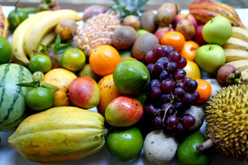Organic tropical fruits mix close up.