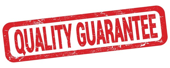 QUALITY GUARANTEE text written on red rectangle stamp.