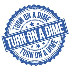 Obraz premium TURN ON A DIME text on blue round stamp sign