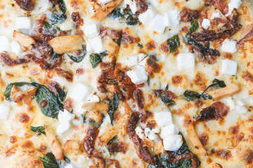  Pizza with spinach, feta, chicken, and sun-dried tomatoes