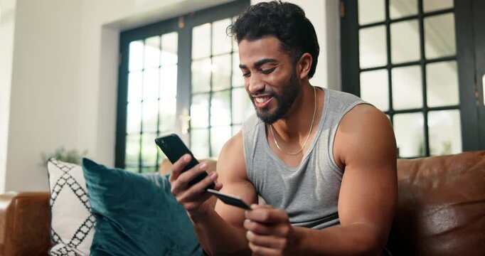 Happy man, phone and sofa with credit card for ecommerce, payment or remote banking in home. Male person, shopper or smile with mobile smartphone, app or debit for online shopping or virtual purchase