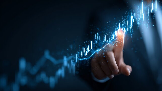An image of a businessman's hand touching a glowing chart that represents growth and profit in the financial sector.