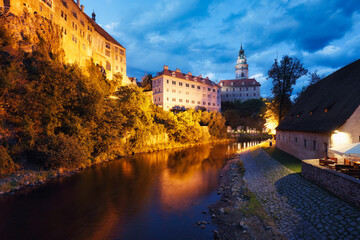 Beautiful view of castle and river Vltava in Cesky Krumlov after sunset, Czech republic at night