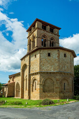 Fototapeta premium Mailhat. Romanesque church with its square bell tower, Puy de Dome department, Auvergne-Rhone-Alpes, France