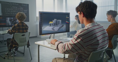 Young Man with Dark Hair Concentrates on 3D House Design at Computer in Classroom. Architectural Visualization, Creative Education. Concept of Digital Skills and Innovative Technologies. Static Shot.