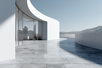 Modern building with curved white walls and large glass windows on a tiled outdoor patio under daylight.