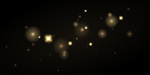 Golden sparks and stars on a transparent background. Magical glow, golden dust and shiny Christmas bokeh effect.