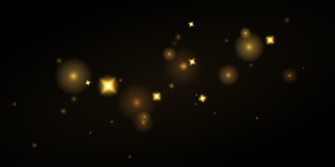 Golden sparks and stars on a transparent background. Magical glow, golden dust and shiny Christmas bokeh effect.