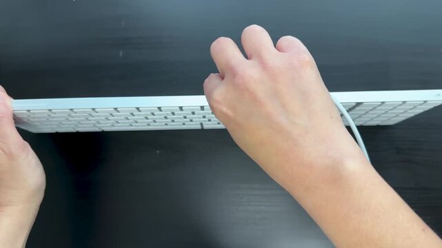 Plugging In a Wired Numeric Keypad Keyboard on Desk