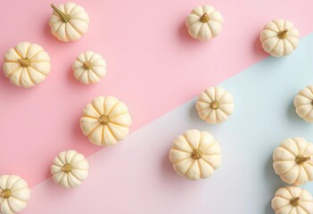 Several small white pumpkins arranged on a pastel pink and blue background,  colorful,  produce