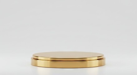 A goldcolored pedestal stands against a plain white backdrop reflecting light from its smooth rounded surfaces