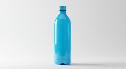 A light blue glass bottle stands on a white surface with a bright studio lighting