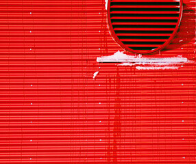 red door with a window background 