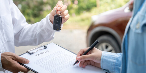 lease, rental car, sell, buy. Dealership manager send car keys to the new owner. Sales, loan credit...