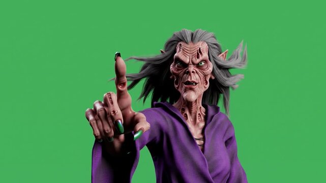 Scary old witch with long green nails points her finger while casting a spell in front of a green screen.
