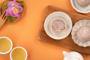 Taro puff pastries with teapot and cups for Mid Autumn Festival