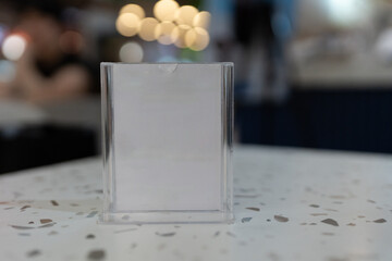 Acrylic tent card displayed on cafe table for menu label, restaurant, cafe or banner