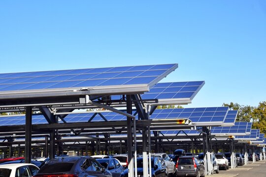 Solar panels are installed on the roof of the parking lot.