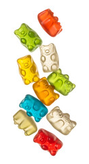 A colorful assortment of gummy bear candies scattered on a white background.