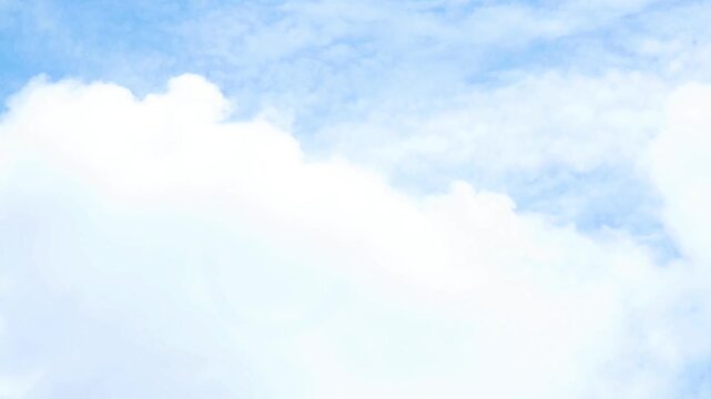 Time-lapse or slow motion of soft, puffy white clouds moving across a bright blue sky. cloudscape with vast white cumulus clouds.