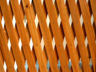 Wooden lattice creating diagonal textured pattern