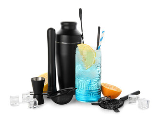 Glass of fresh cocktail and bartender tools isolated on white background