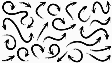Collection of black hand drawn arrows pointing in different directions on a white background surface