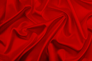Red satin, silk, texture background.