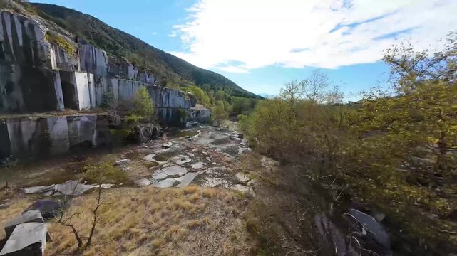 Aerial cruise through old quarry in Palia Kavala Greece, Fpv drone flight