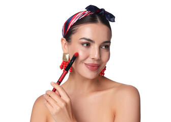 Beautiful woman applying makeup with brush on white background