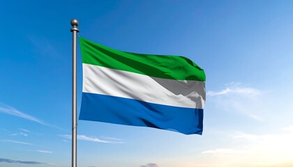 Sierra Leonean flag billowing in a clear blue sky