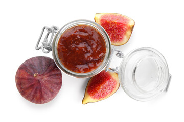 Glass jar of tasty fig jam isolated on white background, closeup