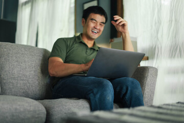 asian man work using computer hand typing laptop keyboard contact us.student study learning education online.adult professional people chatting search at office.concept for technology device business