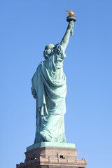 Fototapeta premium Statue of Liberty at sunset in New York City, USA